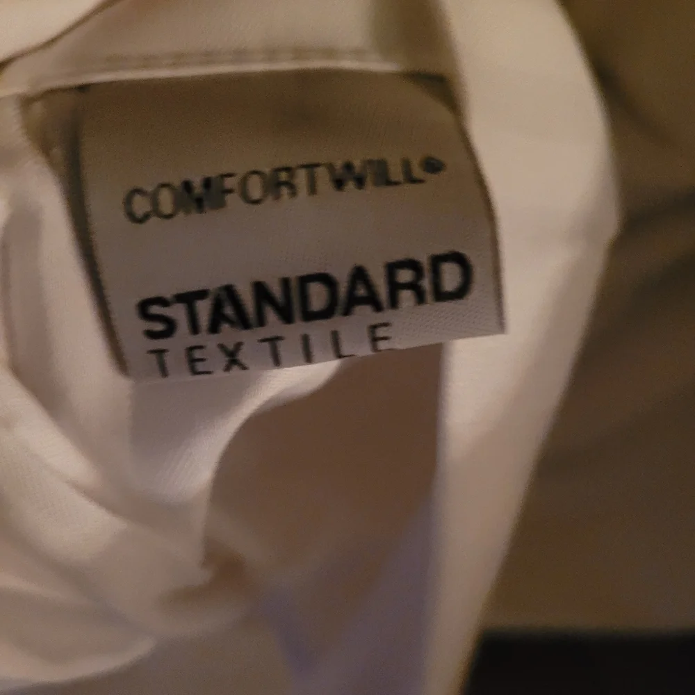 COMFORTWILL® Tone-on-Tone White Hotel Sheet by Standard Textile, QUEEN Flat Wide